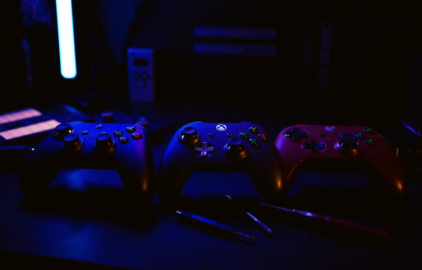 Game controllers on a repair workbench